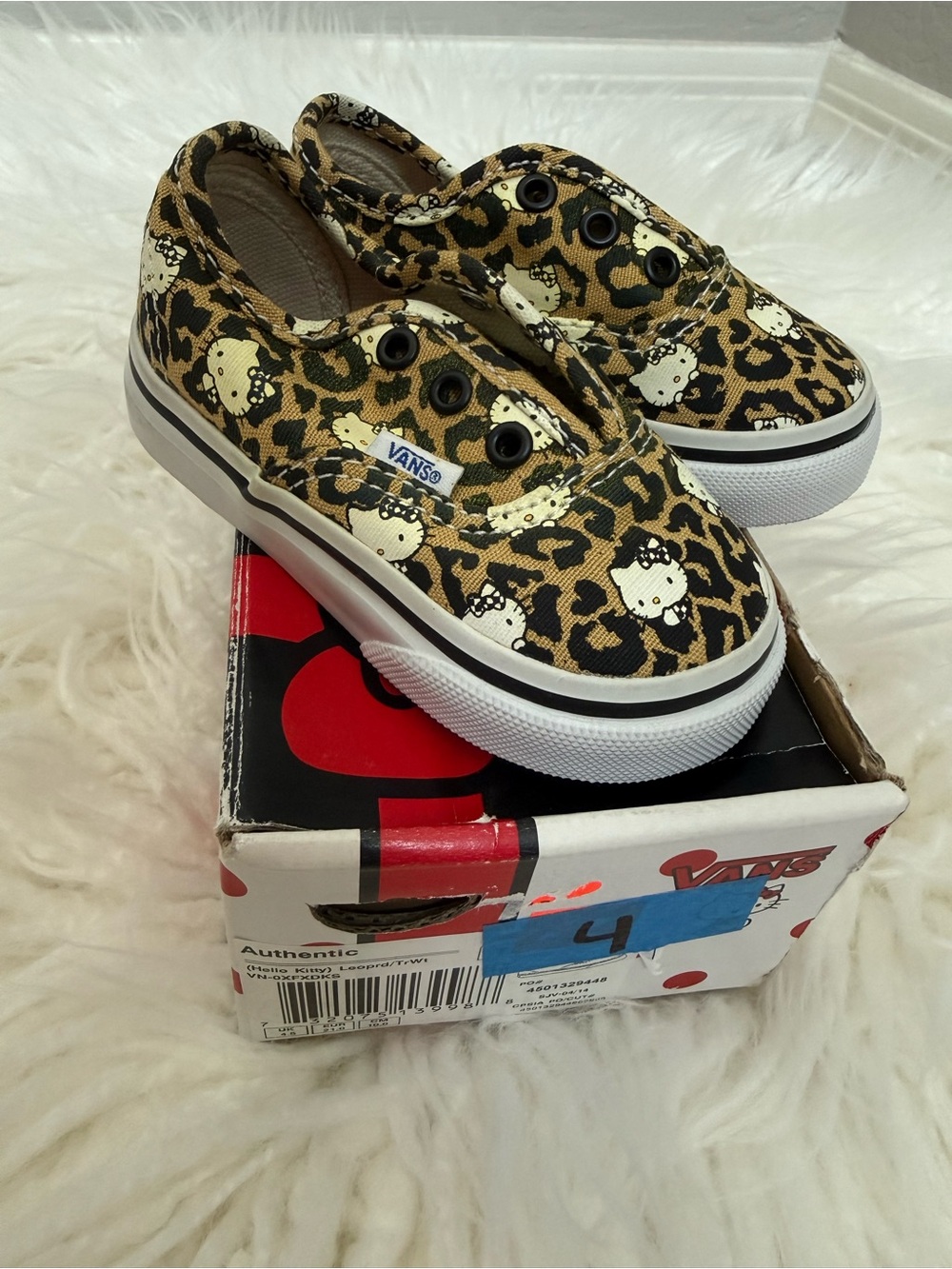 Vans Kids Leopard Hello Kitty Slip-On Sneakers in Tan and Black